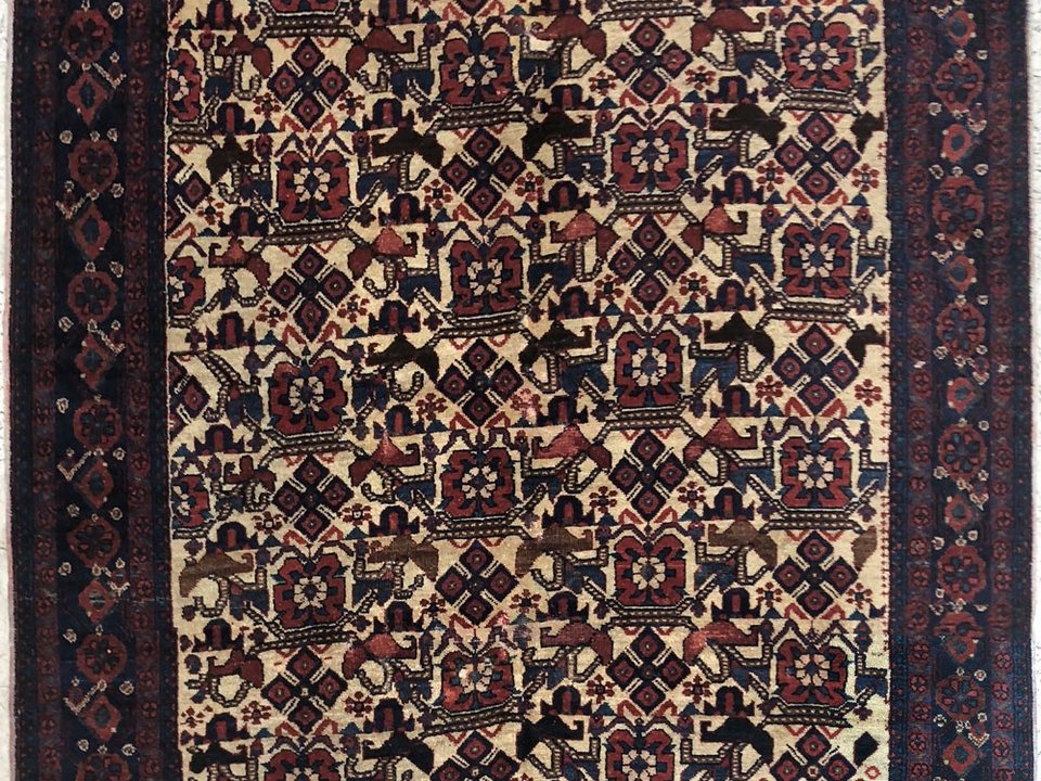Antique Afshar rug showing the softened color of natural dyes